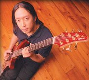 著名前卫金属乐团梦剧院贝斯手John Myung